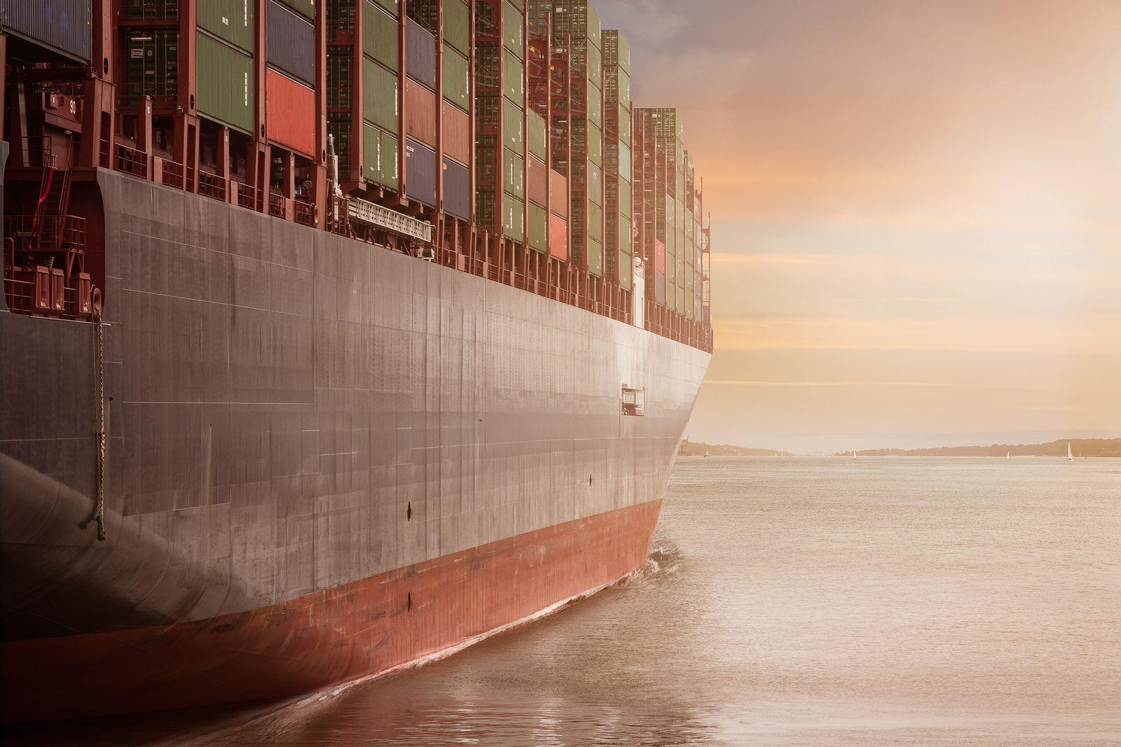 Cargo ship sailing across open water